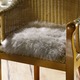 Wohnaccessoires - Merino-Lammfell-Sitzauflage in Tierform – Farbe TAUPE – Ansicht 1 Wohnaccessoires - Merino-Lammfell-Sitzauflage in Tierform, in Farbe NATURWEISS – Farbe TAUPE – Ansicht 1