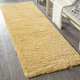 Modern - Traumhaft flauschige Brücken und Teppiche in Shaggy-Qualität – Farbe GOLD – Ansicht 3 Modern - Traumhaft flauschige Brücken und Teppiche in Shaggy-Qualität, in Größe 111 (Brücke 60x90 cm) bis 304 (Teppich rund ø 150 cm), in Farbe GOLD – Farbe GOLD – Ansicht 3