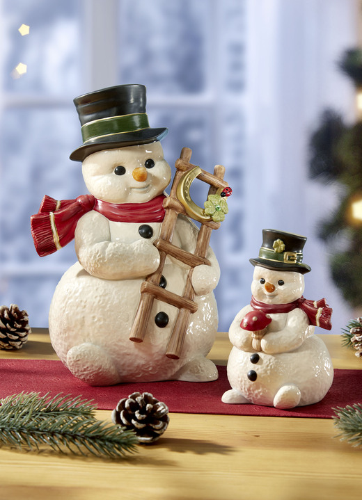 Goebel-Figuren - Handgefertigter Schneemann aus dem Hause Goebel Goebel-Figuren - Handgefertigter Schneemann aus dem Hause Goebel, in Farbe WEISS-SCHWARZ-ROT, in Ausführung Schneemann mit Leiter