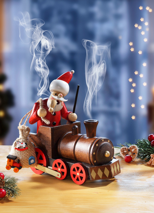 - Räucherfigur Weihnachtsmann in einer Lokomotive, in Farbe BRAUN