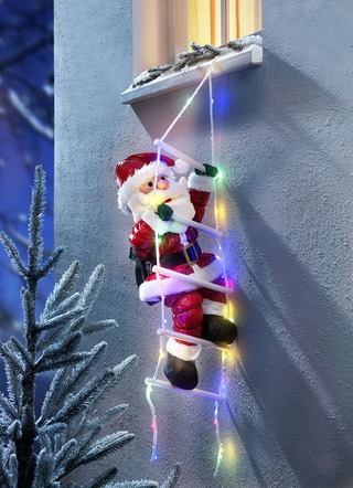 Weihnachtsmann auf LED-Leiter