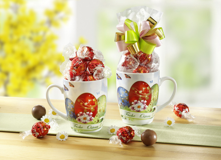 - Porzellan-Tasse mit Lindor-Kugeln, in Farbe