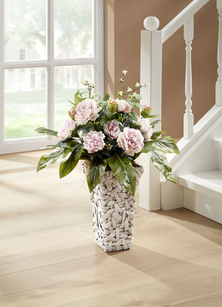 Bauernrosen in Wasserhyazinthen-Korb