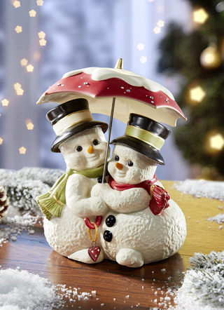 Schneemannpaar mit Schirm