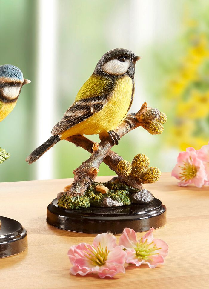 Vogel-Figur auf Zweig 