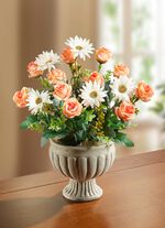 Blumengeteck im Pokal 