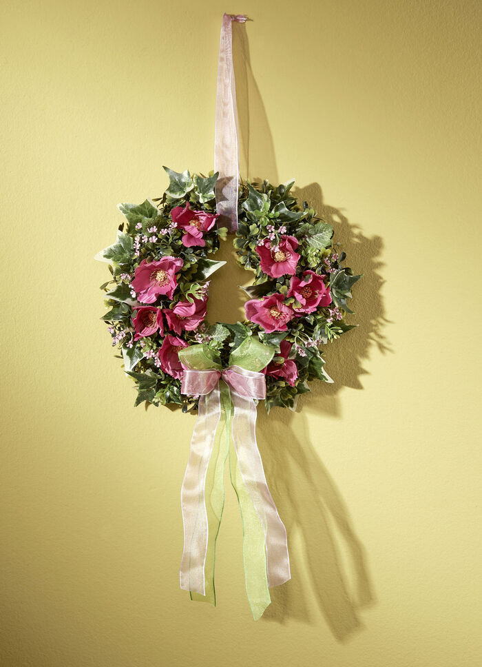 Wandkranz mit rosafarbenen Cosmea-Blüten 