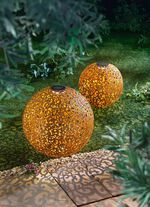 Solarkugel aus rostfarbenem Metall 