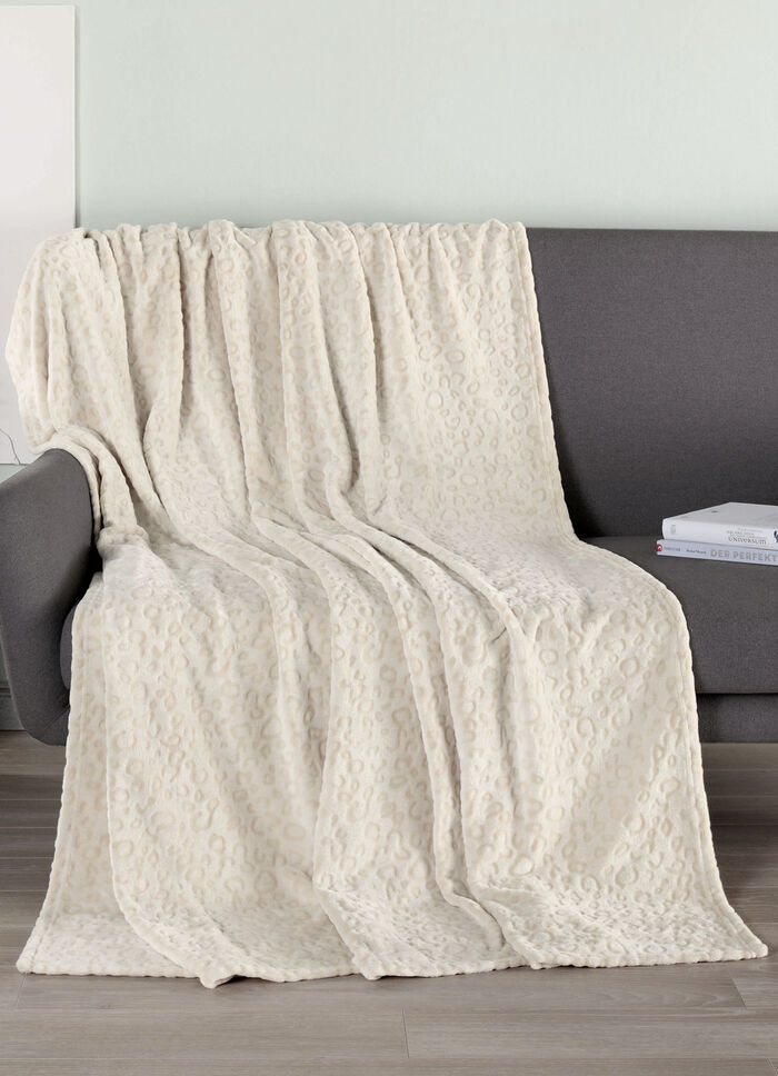 Wohndecke mit Leoparden-Optik 