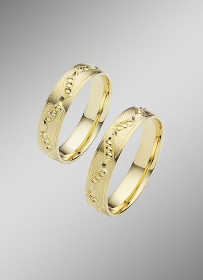 Mattierter Trauring mit Punkte-Muster 