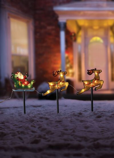 Weihnachtsmann mit Rentierschlitten 