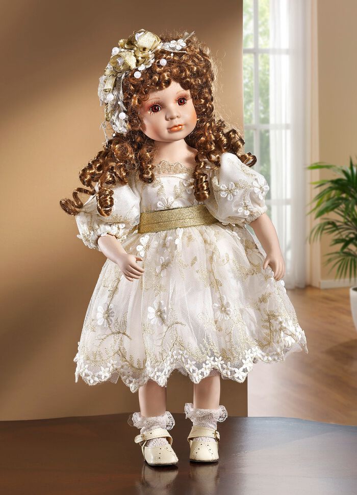 Porzellanpuppe mit festlicher Kleidung 