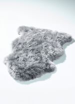 Vorleger aus echtem Lammfell in Tierform 