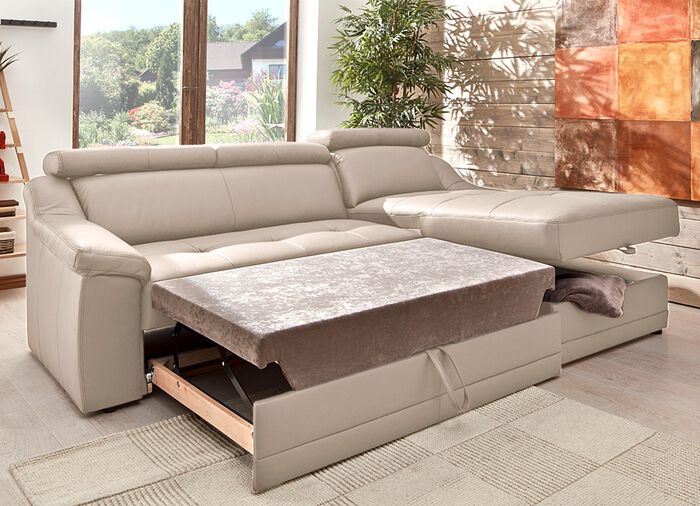 Frei im Raum aufstellbare Polsterecke mit Kopfteilverstellung 