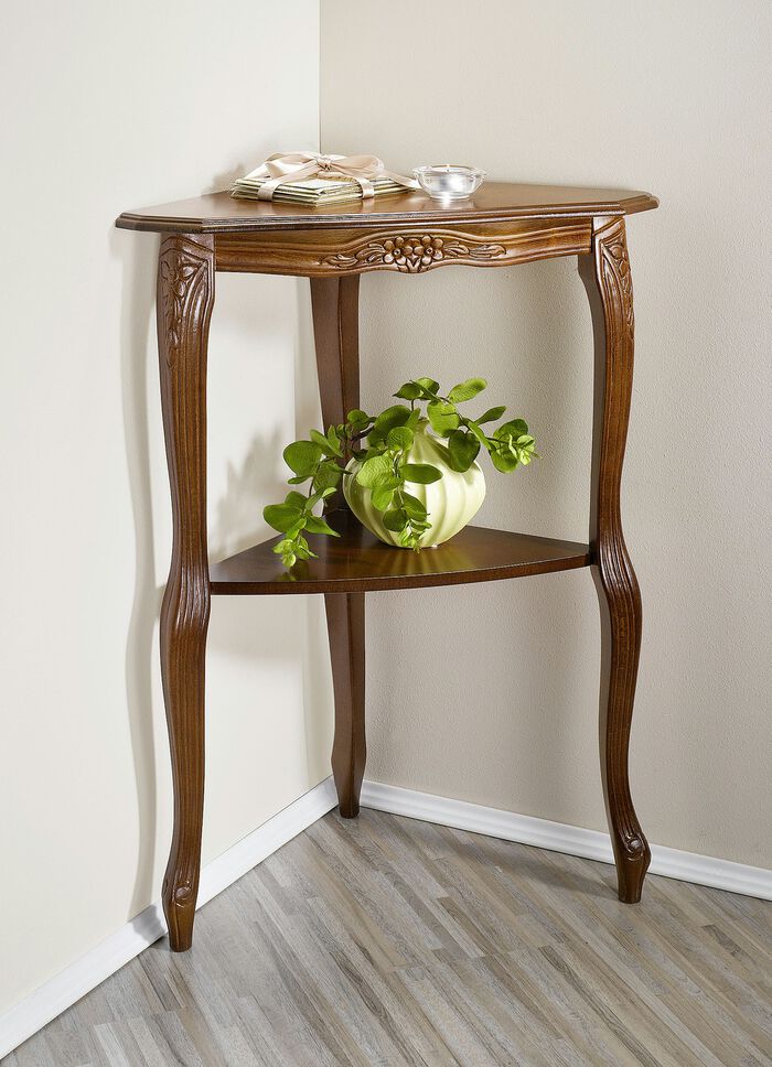 Eckregal mit aufwendiger Zierschnitzerei 