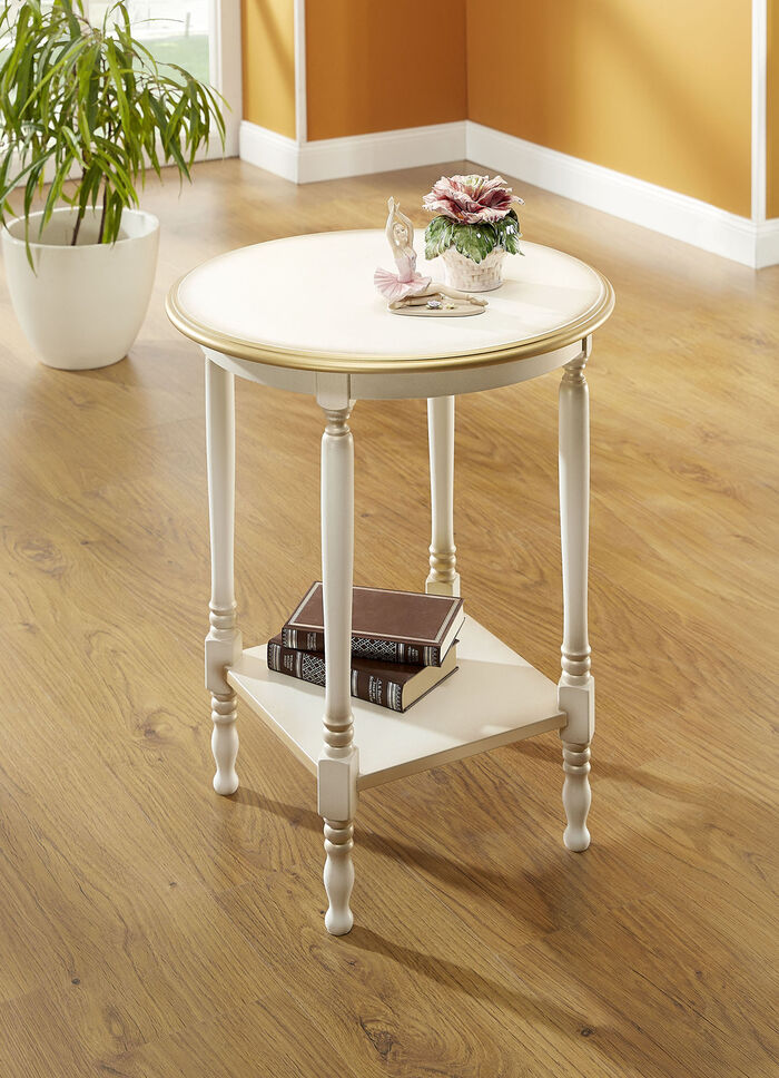 Teilmassiver Beistelltisch mit goldfarbenen Applikationen 