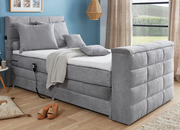 Boxspringbett mit elektrisch versenkbarer TV-Halterung 