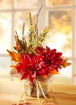 Gesteck in Jutesack ORANGE