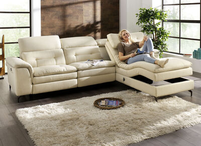 Polsterecke mit verstellbarer Kopfstütze und Ottomane 